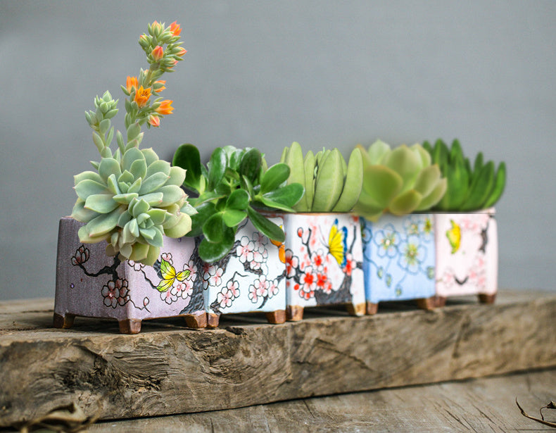 Butterfly and blossoms ceramic planters